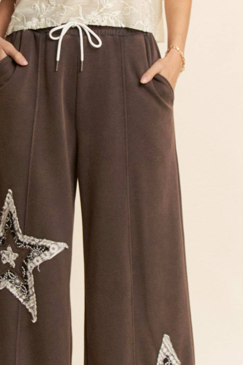THE CURVY DENIM STAR PATCHWORK PANTS