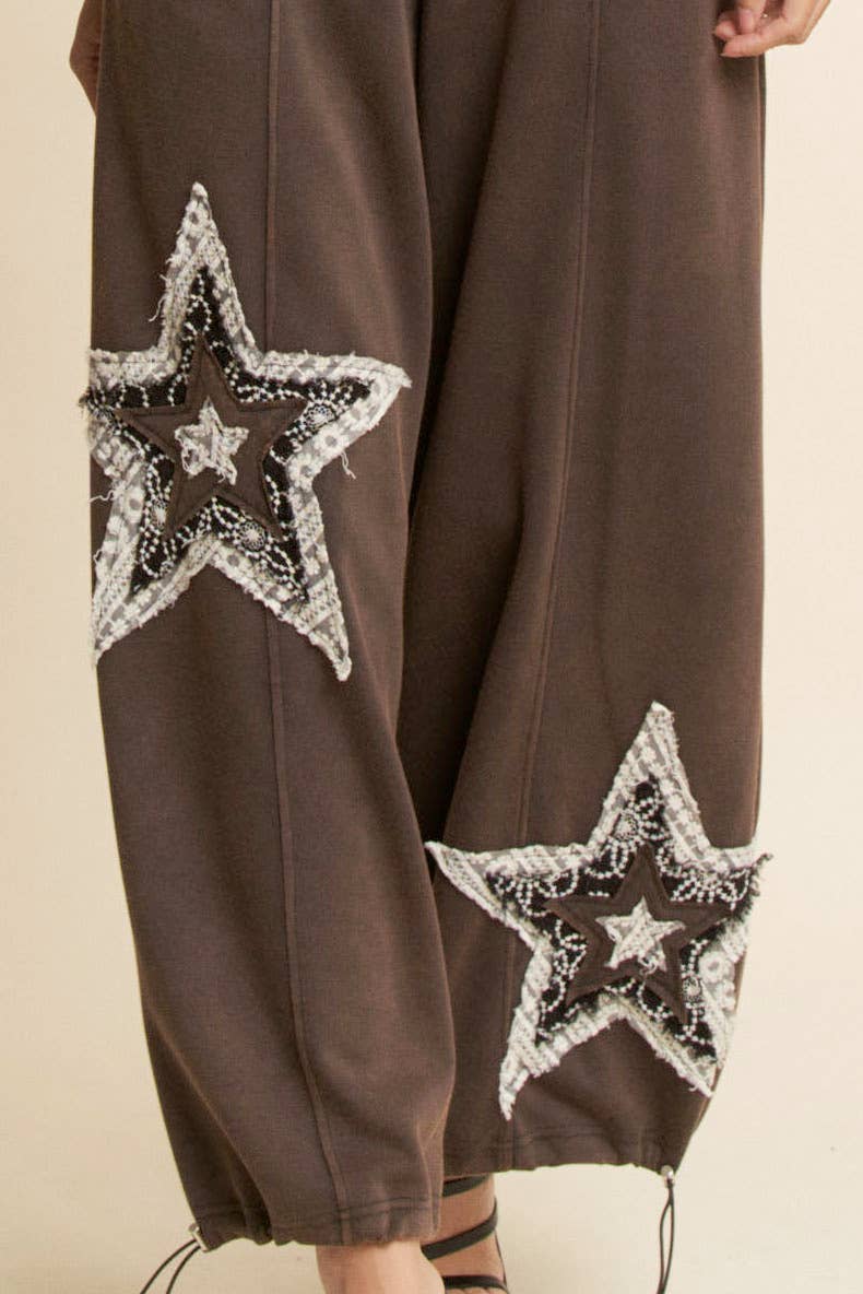 THE CURVY DENIM STAR PATCHWORK PANTS