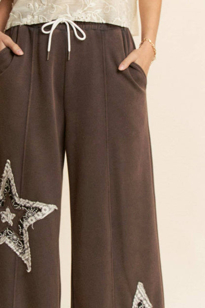 THE CURVY DENIM STAR PATCHWORK PANTS