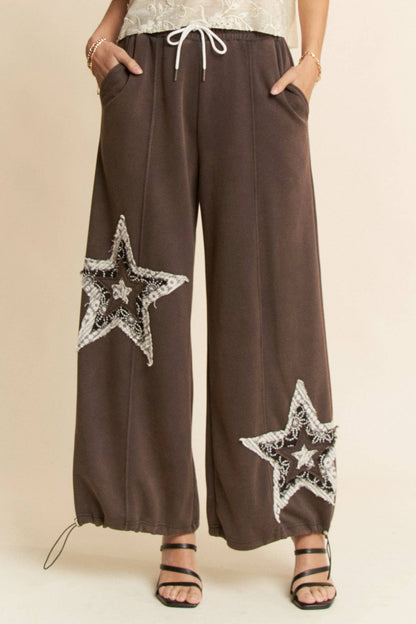THE CURVY DENIM STAR PATCHWORK PANTS