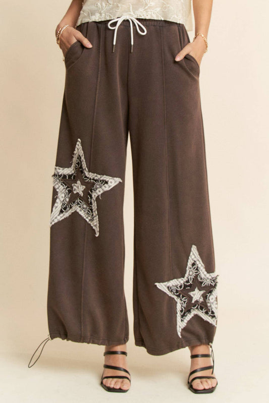 THE CURVY DENIM STAR PATCHWORK PANTS
